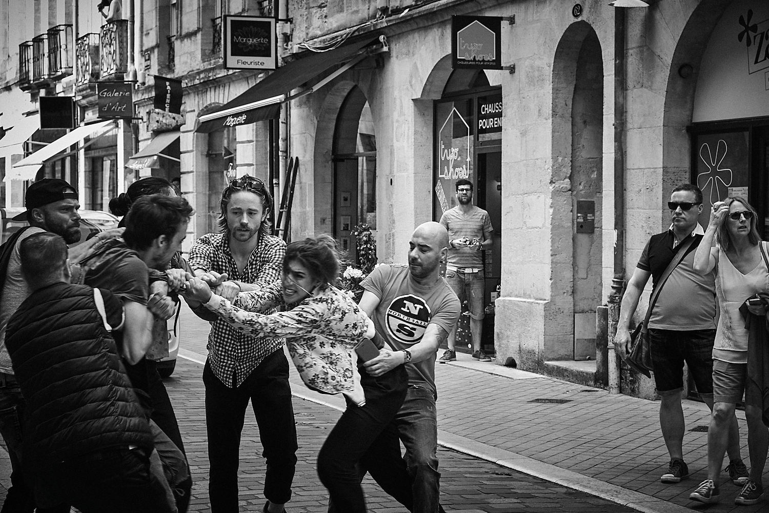 woman fighting for bag